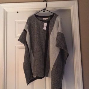 Grey and black poncho